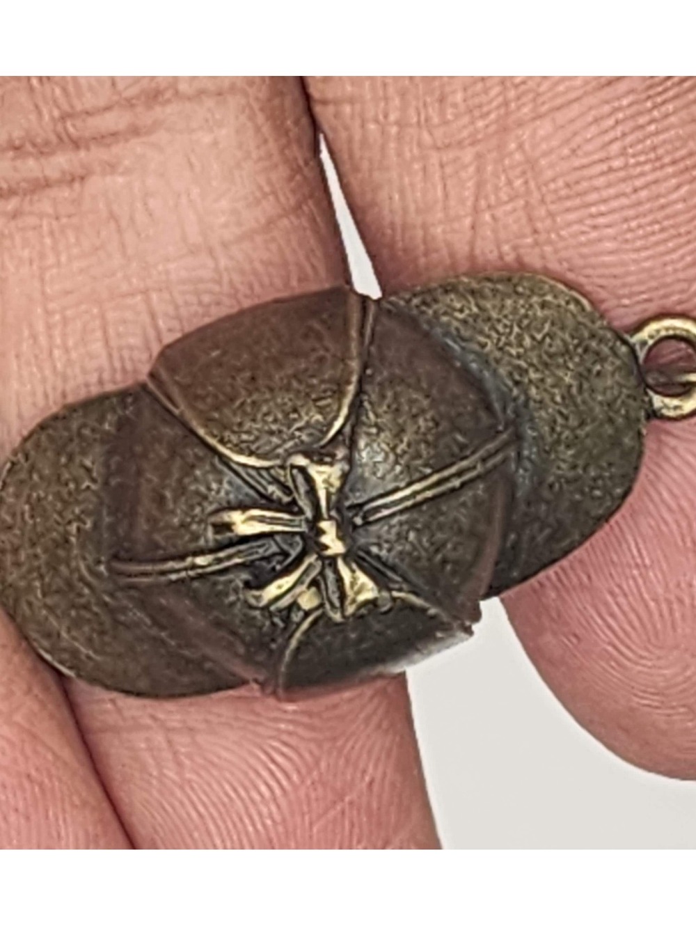 Antique Bronze Cap Charm Softball cap with a bow on top